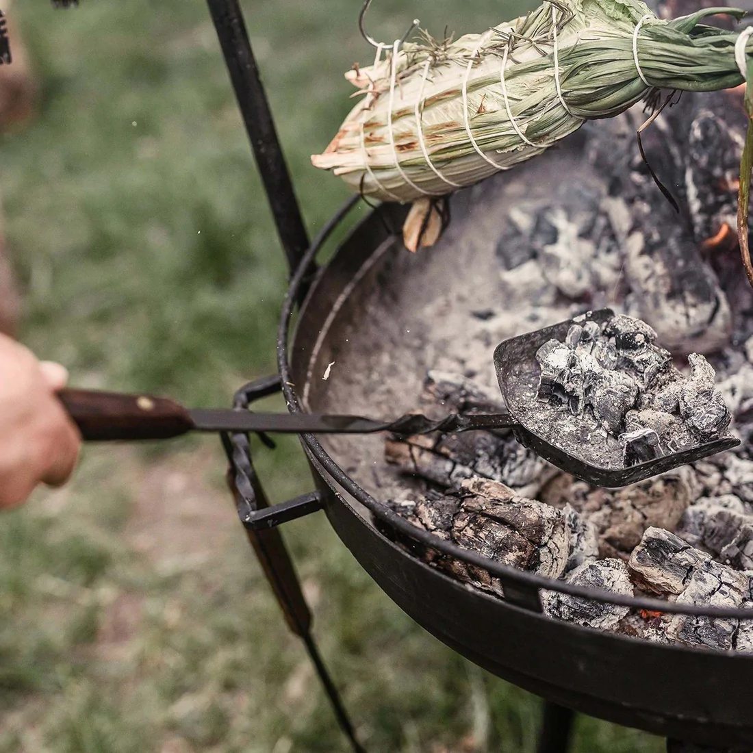 cowboy cooking coal shovel